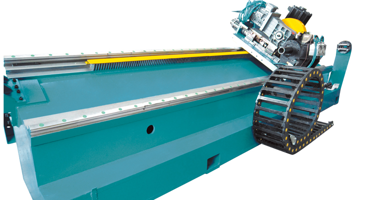 Cutting flying saw for welded pipe lines: saw unit on the machine bed