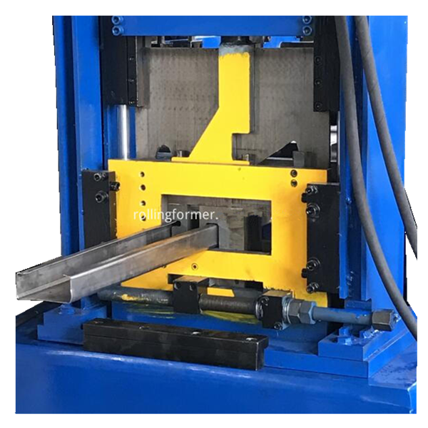C purlin roll forming machine: forming station with the steel strip passing through the dies