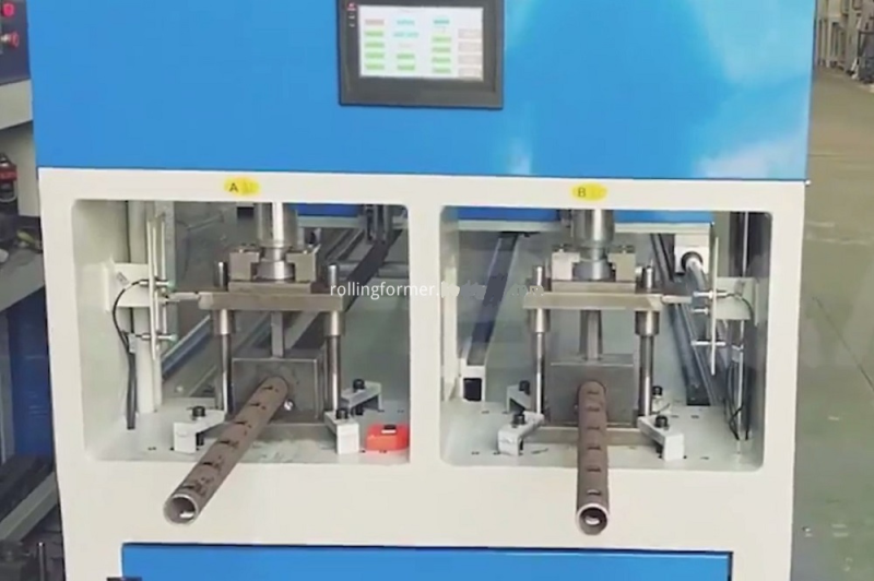 Double station holes profile channel punching machine: punch stations with tubes clamped