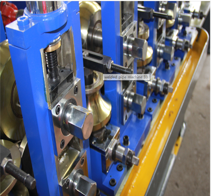 Welded square pipe machine: forming rolls and shafts close-up