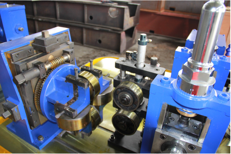 ERW pipe tube rolling line: forming roll and strip close-up